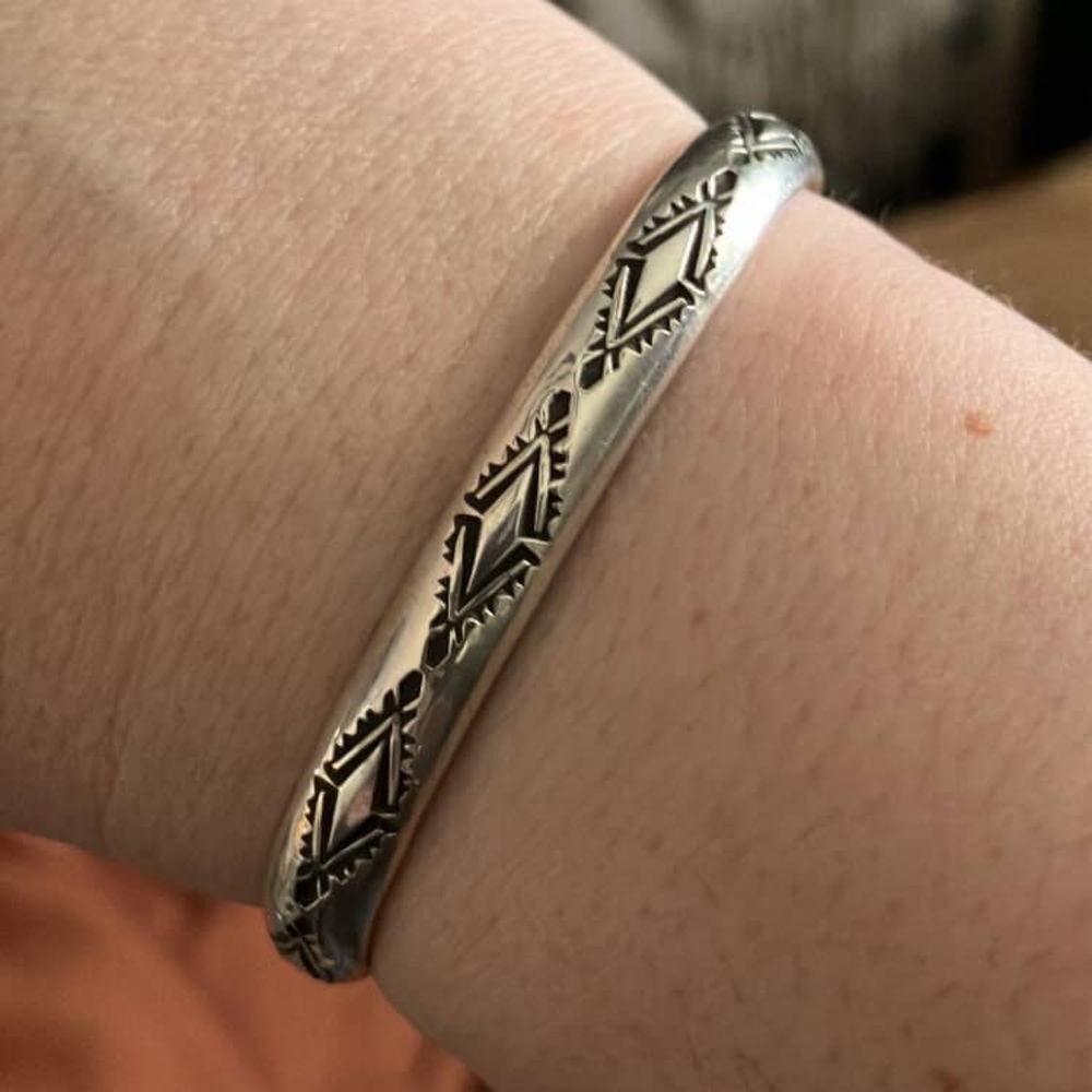 *CONSIGNED* Diamond stamped Sterling silver cuff size small by Grizzly bear